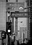Vertical The Harbor Freeway and Olympic Boulevard Signs landscape black and white Photography