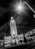 Vertical The Freedom Tower off Biscayne Boulevard black and white Photos