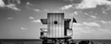 Panoramic A Lifeguard Shack and Beach Warning Flag black and white Photos