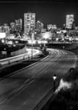 Vertical The Milwaukee Skyline at Night Framed Photos