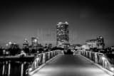 Horizontal Milwaukee Skyline Pedestrian Bridge near Pier Wisconsin black and white Photos