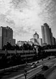 Vertical Traffic Along North Lincoln Memorial Drive black and white Photos