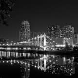 Square The Hennepin Ave Bridge Reflects in the Mississippi River Photography