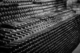 Horizontal Wine Bottles on top of Wine Bottles black and white Photos