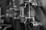 Horizontal Wine Tank Valves black and white Photos
