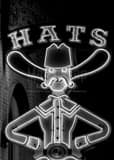 Vertical The Top Half of the Hats and Boots Neon Sign Photographs