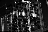 Horizontal Beads Hang above Bourbon Street in the French Quarter black and white Photos