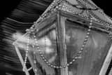 Horizontal Beads on a Lamp Post in the French Quarter black and white Photos