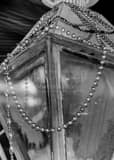 Vertical Beads on a Lamp Post in the French Quarter black and white Photos