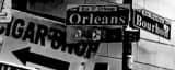 Panoramic Bourbon Street and Orleans Street Signs black and white Photos