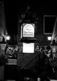 Vertical Court of Two Sisters Restaurant black and white Photos