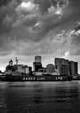 Vertical The New Orleans Skyline and Mississippi River Barge Framed Photos
