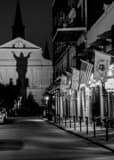 Vertical A Silhouette of Christ on St Louis Cathedral black and white Photos