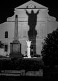 Vertical The Statue and Shadow of Jesus on St Louis Cathedral black and white Photos