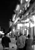 Vertical People Stroll along Bourbon Street black and white Photos