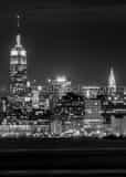 Vertical The Midtown Manhattan Skyline at Night from Liberty Park Framed Photos
