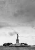 Vertical The Statue of Liberty and Liberty Island from the New York Harbor Framed Photos