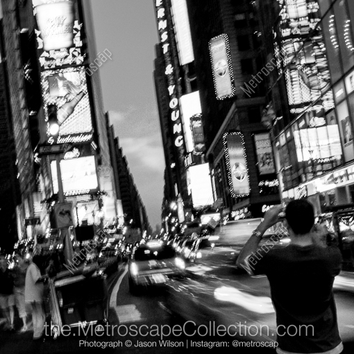 New York City Black and White Photos of A Photographer Trying to Capture Times Square A Photographer Trying to Capture Times Square -- New York City Black and White Photos