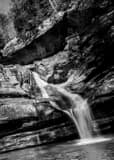 Vertical Cedar Falls near Old Man's Cave black and white Photos