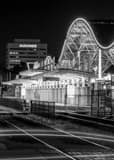 Vertical The Downtown Orlando Lynx Station at Night Framed Photos