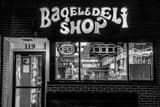 Horizontal Oxford\'s Famous Bagel and Deli Shop at Night black and white Photos