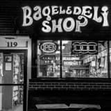 Square Oxford\'s Famous Bagel and Deli Shop at Night black and white Photos