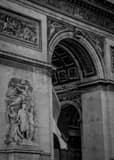 Vertical A Close-up Shot of the Arc de Triomphe landscape black and white Photography