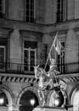 Vertical The Gold Joan of Arc Statue near the Louvre landscape black and white Photography