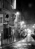 Vertical Rue des Abbesses in Pouring Rain landscape black and white Photography