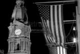 Horizontal The Pinnacle of Philadelphia City Hall and US Flags at Night Photography