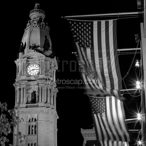 Philadelphia Black and White Photos of The Pinnacle of Philadelphia City Hall and US Flags at Night The Pinnacle of Philadelphia City Hall and US Flags at Night -- Philadelphia Black and White Photos