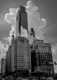 Vertical A Large Thunderhead Rises above the Comcast Tower in Downtown Philadelphia black and white Photos