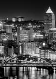 Vertical The Pittsburgh Skyline and Fort Duquense Bridge over the Allegheny River black and white Photos
