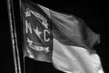Horizontal The North Carolina Flag on the NC Capitol black and white Pictures