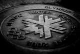 Horizontal An Olympics Manhole Cover black and white Pictures