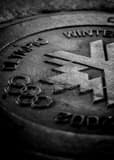 Vertical An Olympics Manhole Cover black and white Pictures