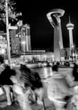 Vertical Pedestrians Cross Losoya Street at Commerce Street black and white Photos