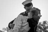 Horizontal The Kissing Sailor Sculpture Near the USS Midway Framed Photos