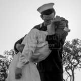 Square The Kissing Sailor Sculpture Near the USS Midway Framed Photos