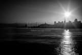 Horizontal A Back-lit Bay Bridge and San Francisco Skyline at Dawn black and white Photos