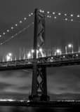Vertical A Bay Bridge Spire at Night black and white Photos