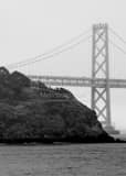 Vertical The Bay Bridge and Yerba Buena Island in Afternoon Mist black and white Photos