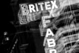 Horizontal The Britex Fabrics Sign black and white Photos