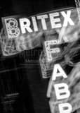 Vertical The Britex Fabrics Sign black and white Photos