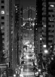Vertical Looking Down California Street and the Bay Bridge at Night black and white Photos