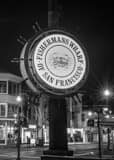 Vertical Fishermans Wharf at Night black and white Photos
