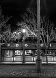 Vertical The Fog City Cafe under Coit Tower black and white Photos