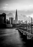 Vertical Gaslights Line Pier 7 in San Francisco black and white Photos