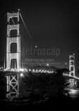 Vertical The Golden Gate Bridge over San Francisco Bay at Night black and white Photos