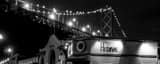 Panoramic The Hi Dive Bar along the Embarcadero under the Bay Bridge black and white Photos